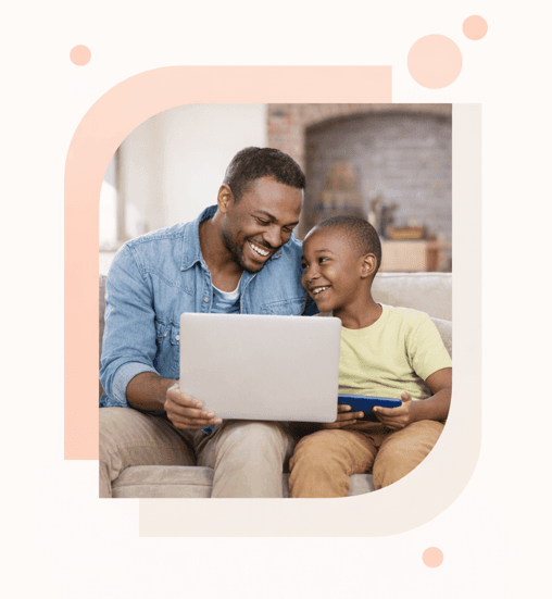 Parent and child using laptop